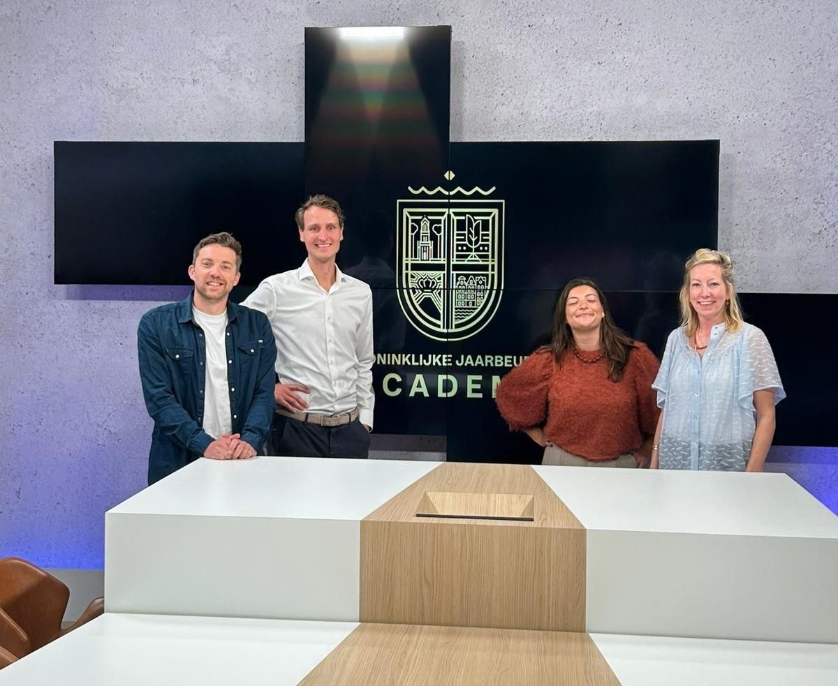 Vier Personen von Royal Jaarbeurs und Data Booster in der Koninklijke Jaarbeurs Academy