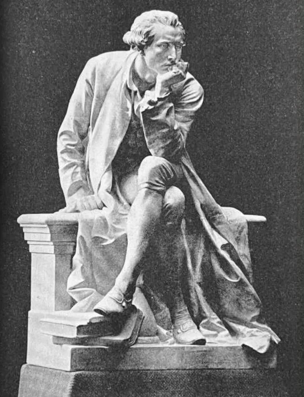 Statue d'un homme assis en habit du XVIIIe siècle, dans une attitude de réflexion