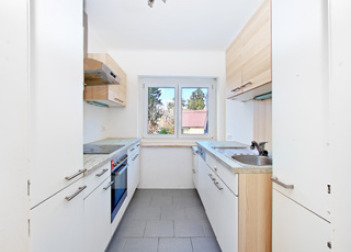 Vielseitiges Ein- oder Zweifamilienhaus mit großzügiger Dachterrasse in beliebter Lage