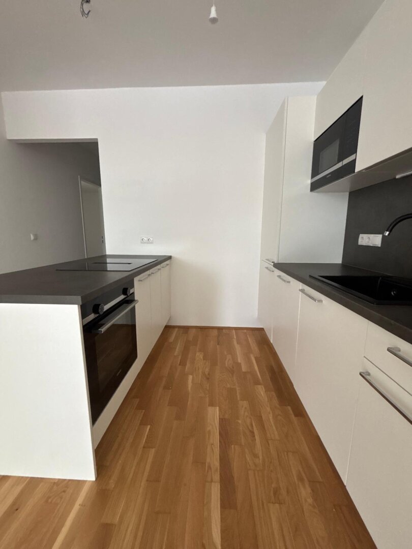 Neuwertige 3-Zi-Wohnung mit Balkon in Graz, 68m², Fußbodenheizung, Aufzug, Wohnküche!