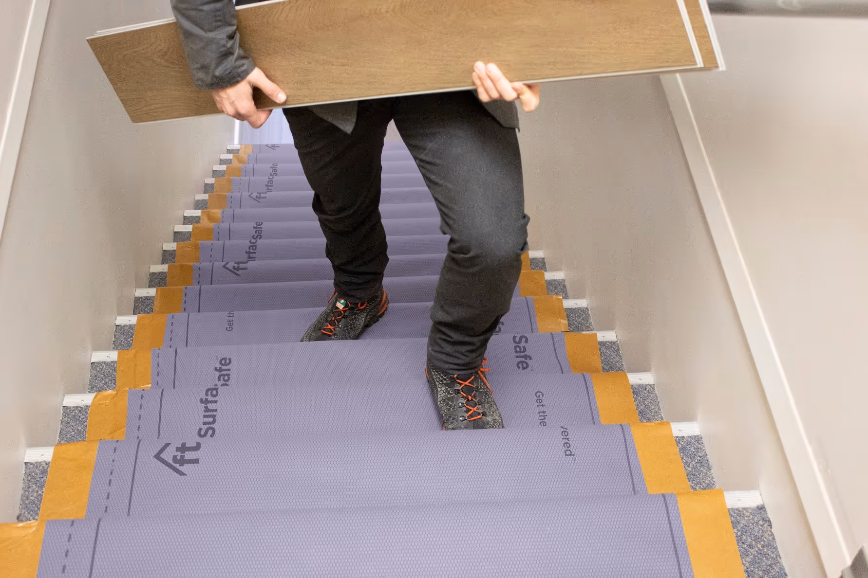 A worker walking across surface safe.