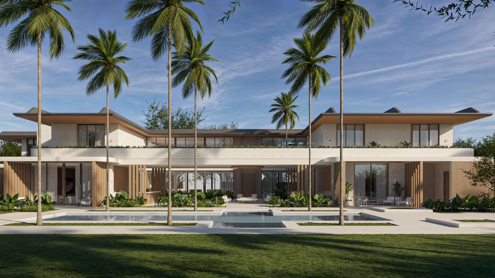 Modern two-story residence framed by palm trees and a reflecting pool