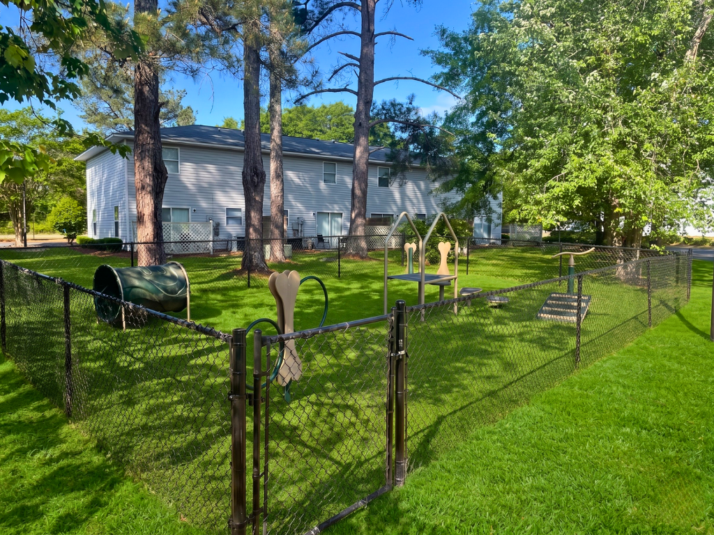 Manicured lawn and green space at Claxton Pecan townhomes Dublin GA