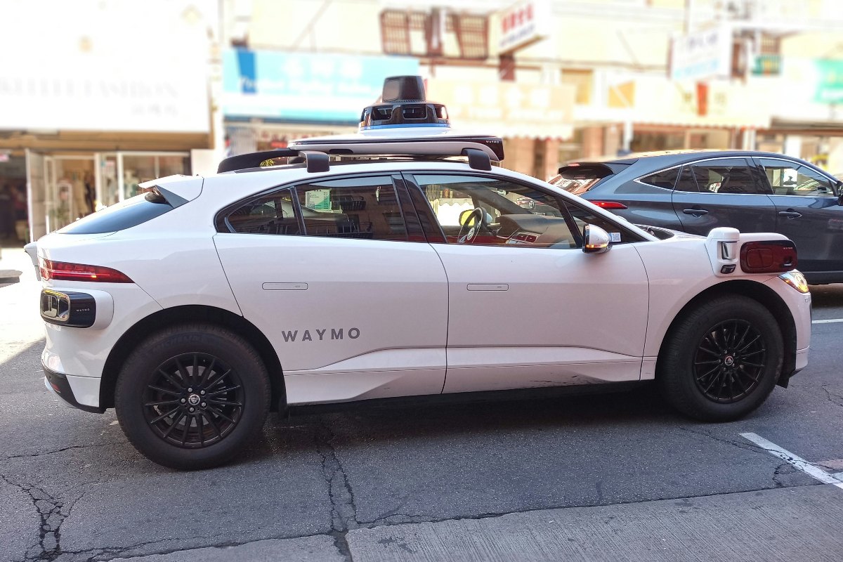 Waymo self-driving car parked on a city street