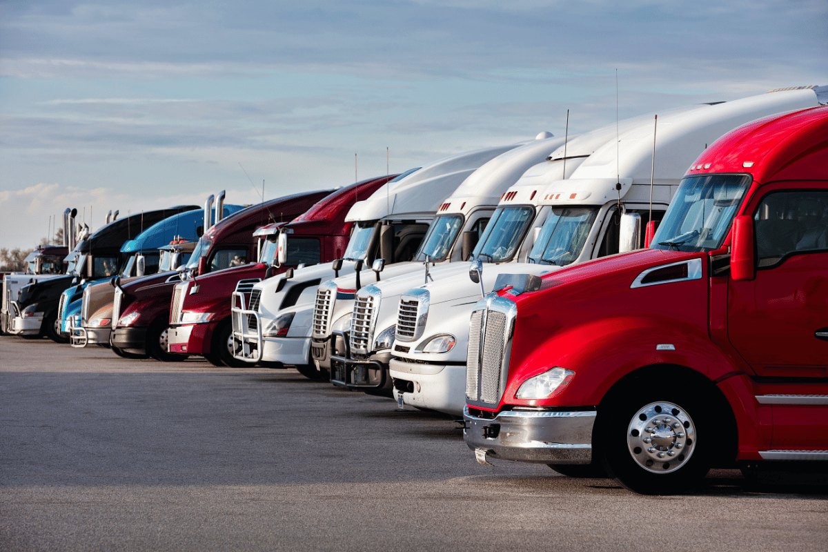 Row of parked semi-truck cabs, illustrating data and technology in truck wreck litigation