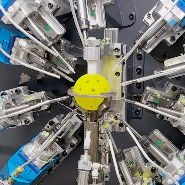 automatic hole drilling for pickleball balls