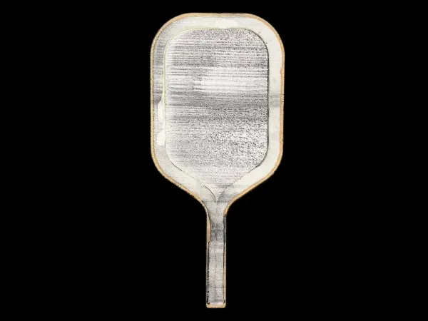 Multi-material foam core construction inside a pickleball paddle