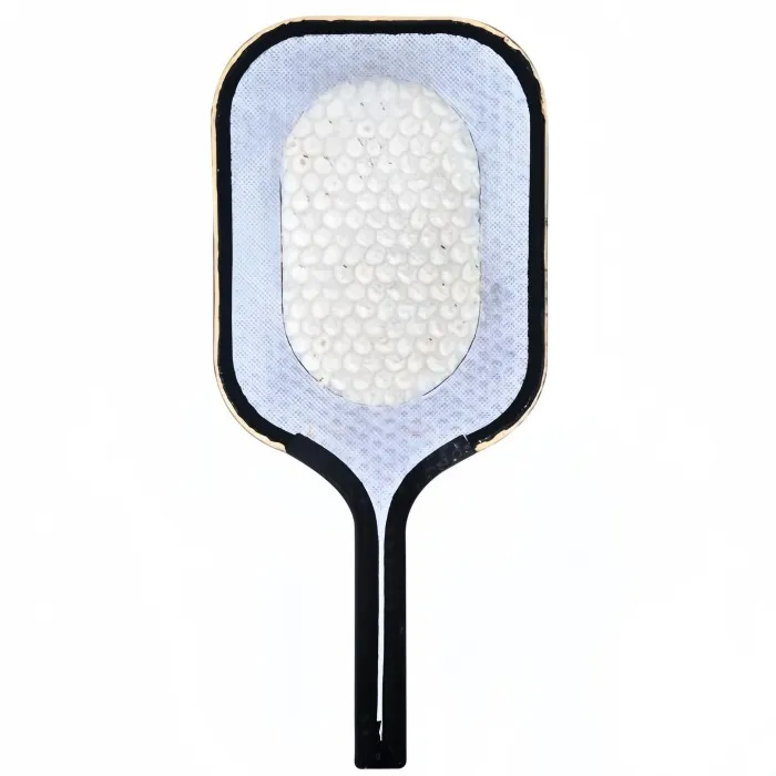 Pickleball paddle core cutaway showing honeycomb and foam construction