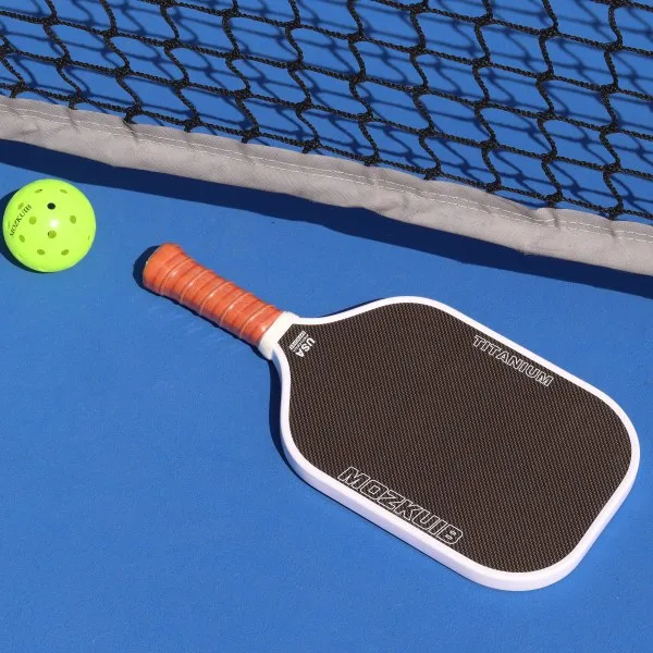 Mozkuib pickleball paddle and ball used for an on-court foam-core comparison