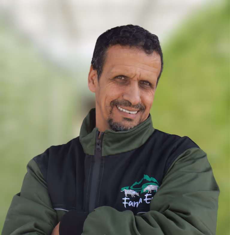 Image of a farm employee. The link takes you to the employee's special page.