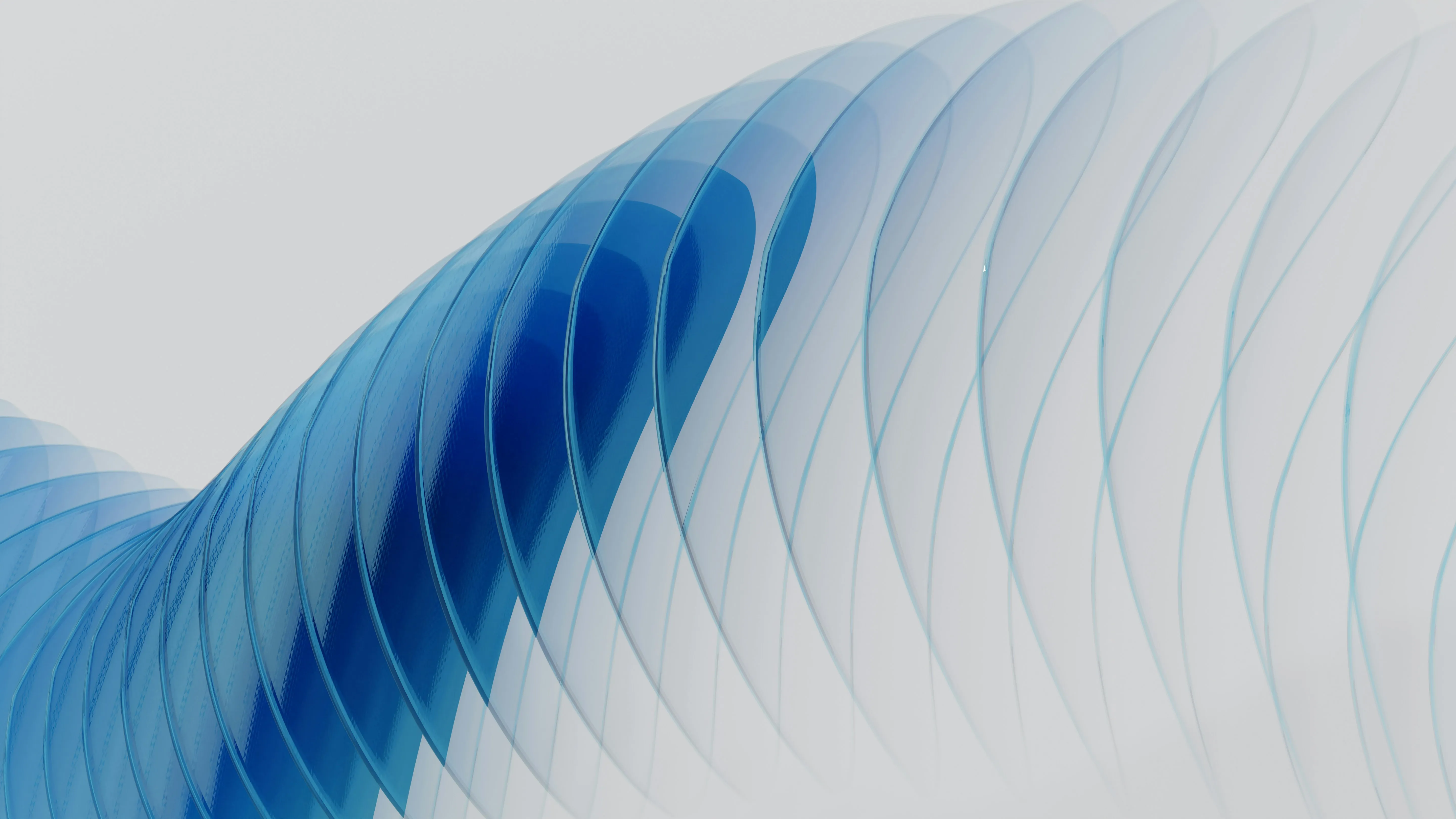 Verschwommene, blaue, geschwungene Linien, die sich diagonal über einen hellen Hintergrund erstrecken.