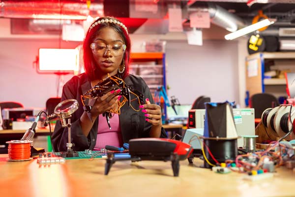 A student works on her STEM project in class
