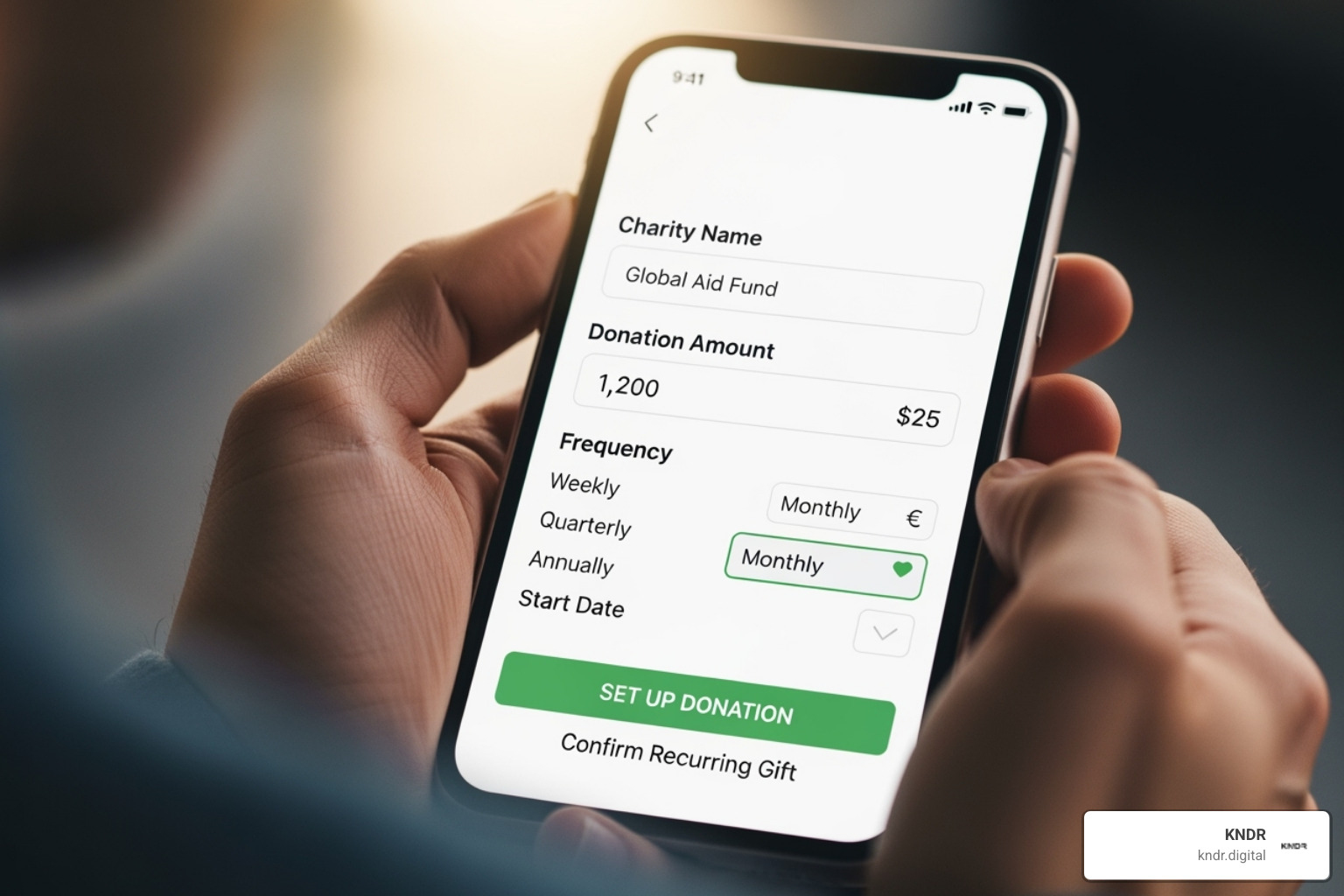 A donor setting up a monthly gift on a mobile phone, emphasizing the convenience and growing popularity of recurring donations. - nonprofit fundraising trends 2024 A donor setting up a monthly gift on a mobile phone, emphasizing the convenience and growing popularity of recurring donations. - nonprofit fundraising trends 2024