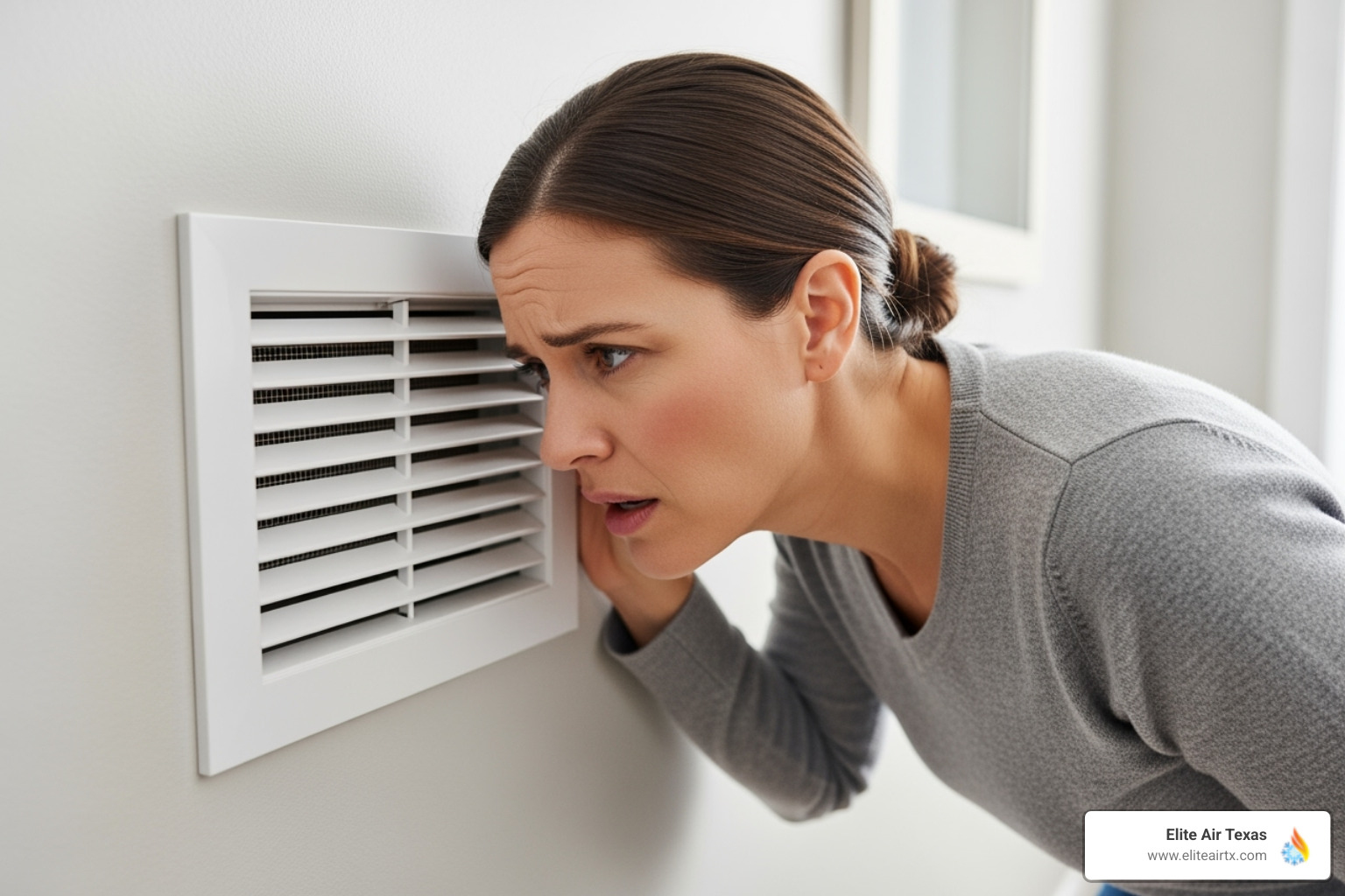 homeowner listening to noisy air vent - hvac maintenance mckinney tx