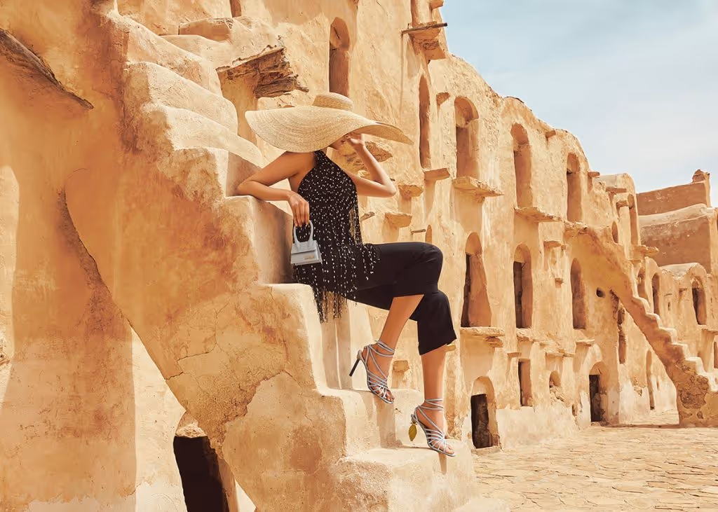 Models showcasing the latest Jacquemus fashion collection, exemplifying the brand's signature style and design.