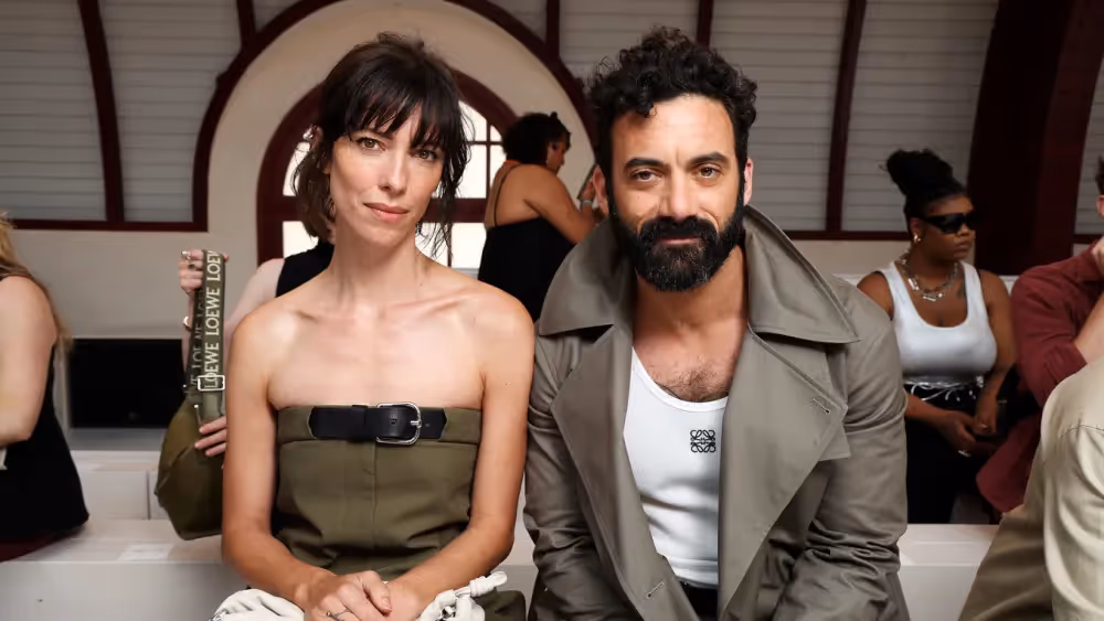 Sabrina Carpenter attends LOEWE's men's fashion event, wearing an elegant mint green gown and showcasing her chic style.