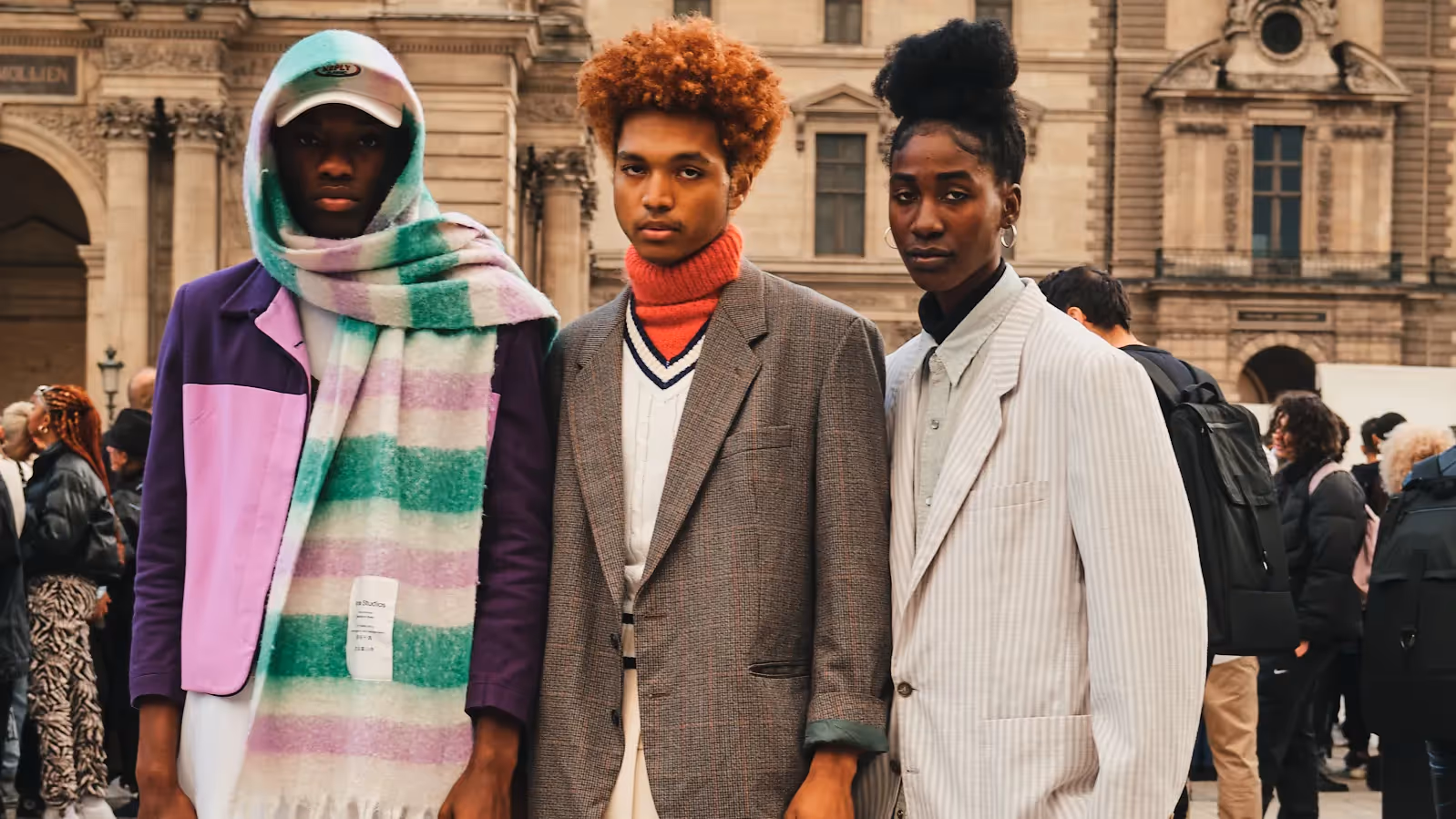 Models showcasing vibrant street style looks during Paris Fashion Week, blending high fashion with urban aesthetics. The diverse outfits feature bold colors, unique patterns, and innovative accessories, reflecting the latest trends and the creative spirit of the event.