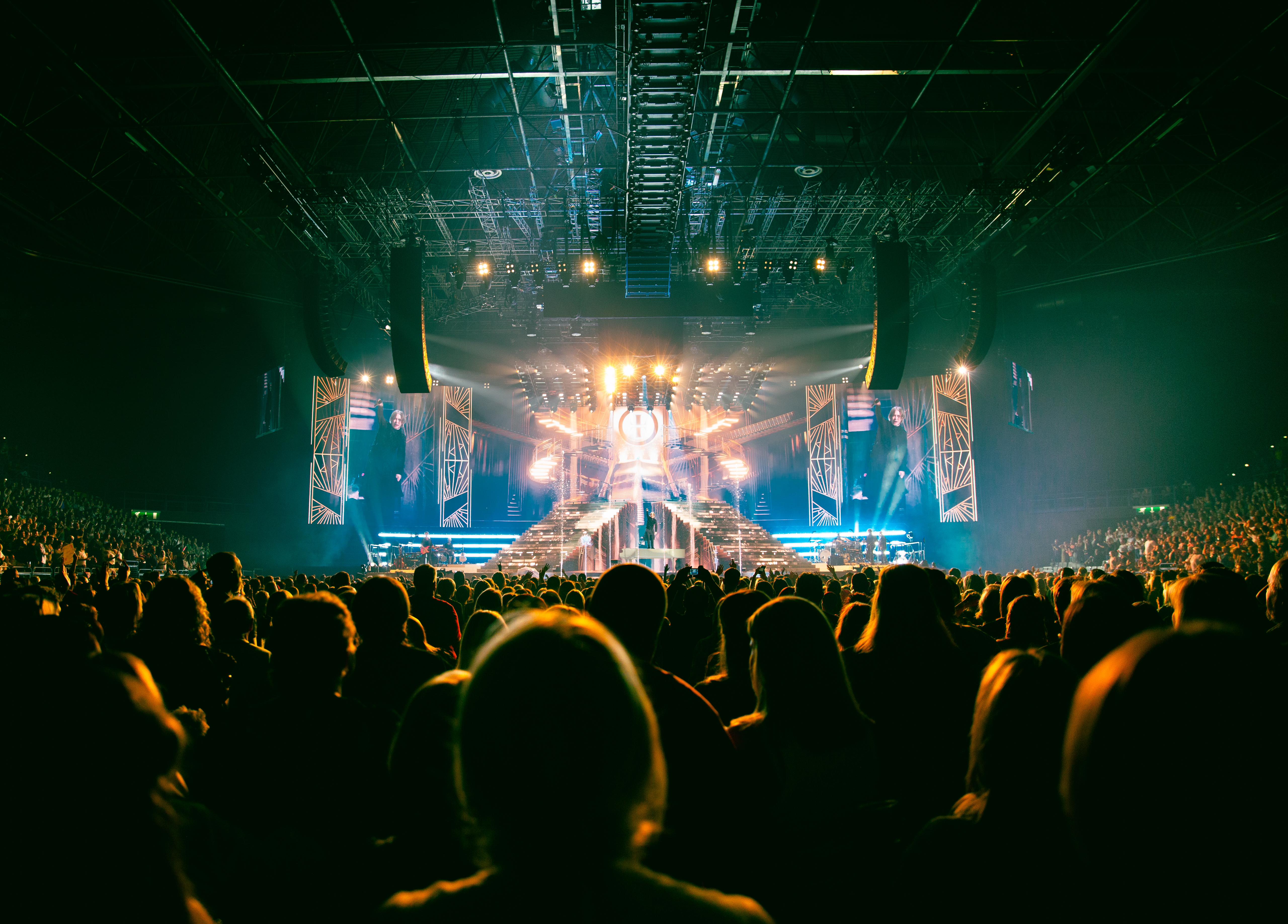 Take That playing to a large crowd in Birmingham