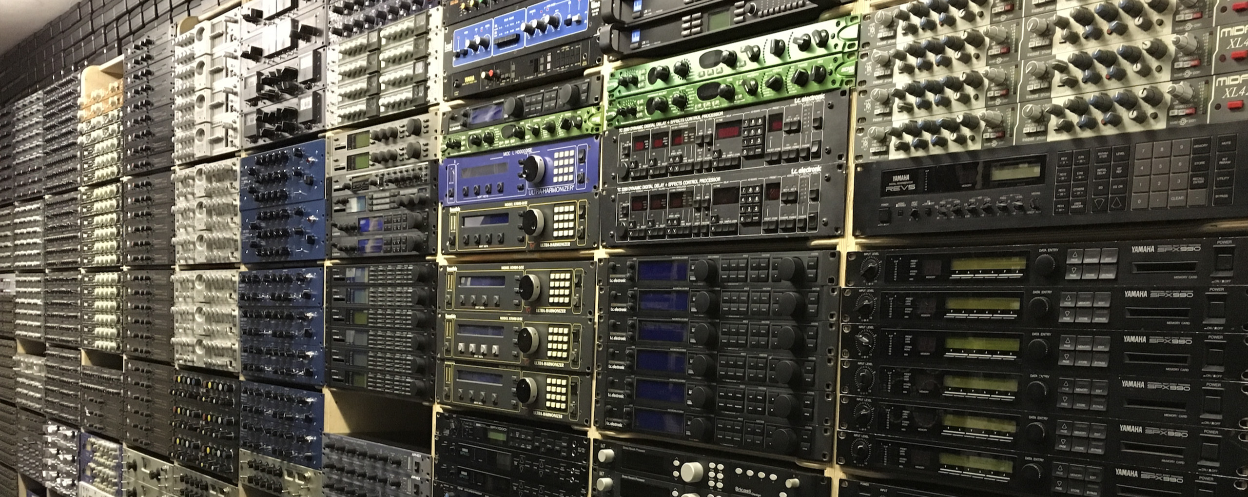 A wall full of various rack gear