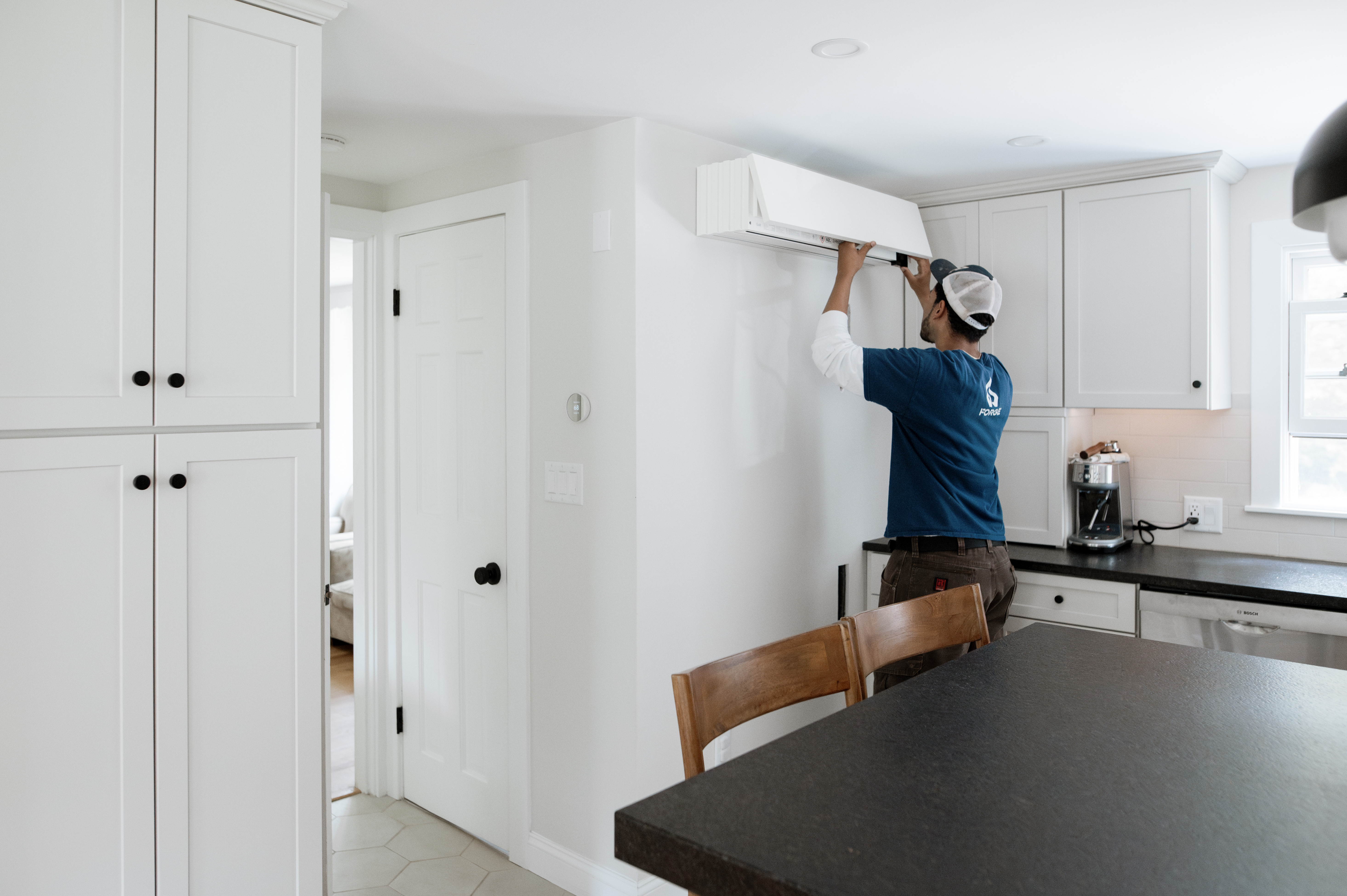 A member of the Forge team working on a job in Massachusetts