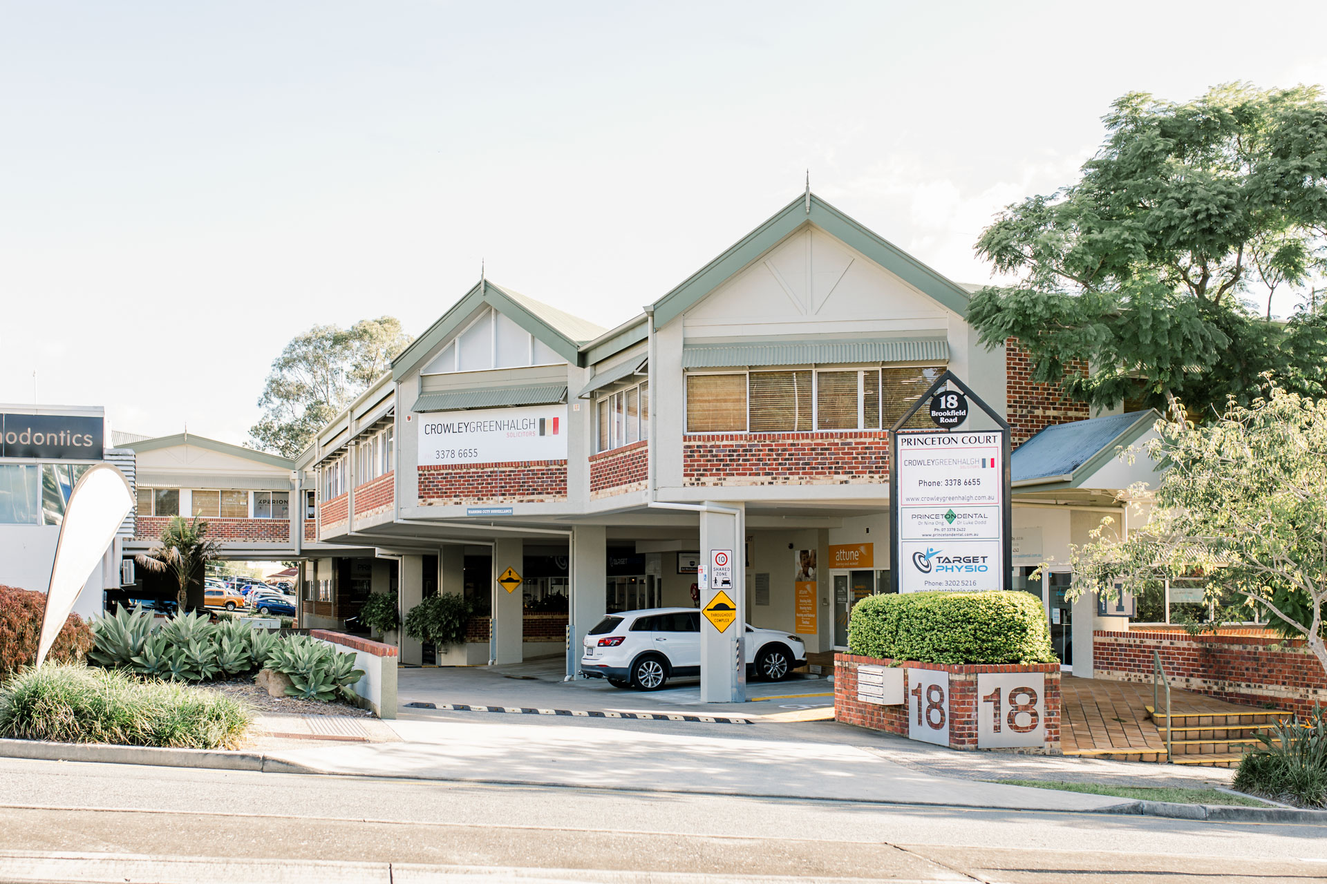 Kiah Place building's front exterior view - highlighting its entrance and nearby surroundings.