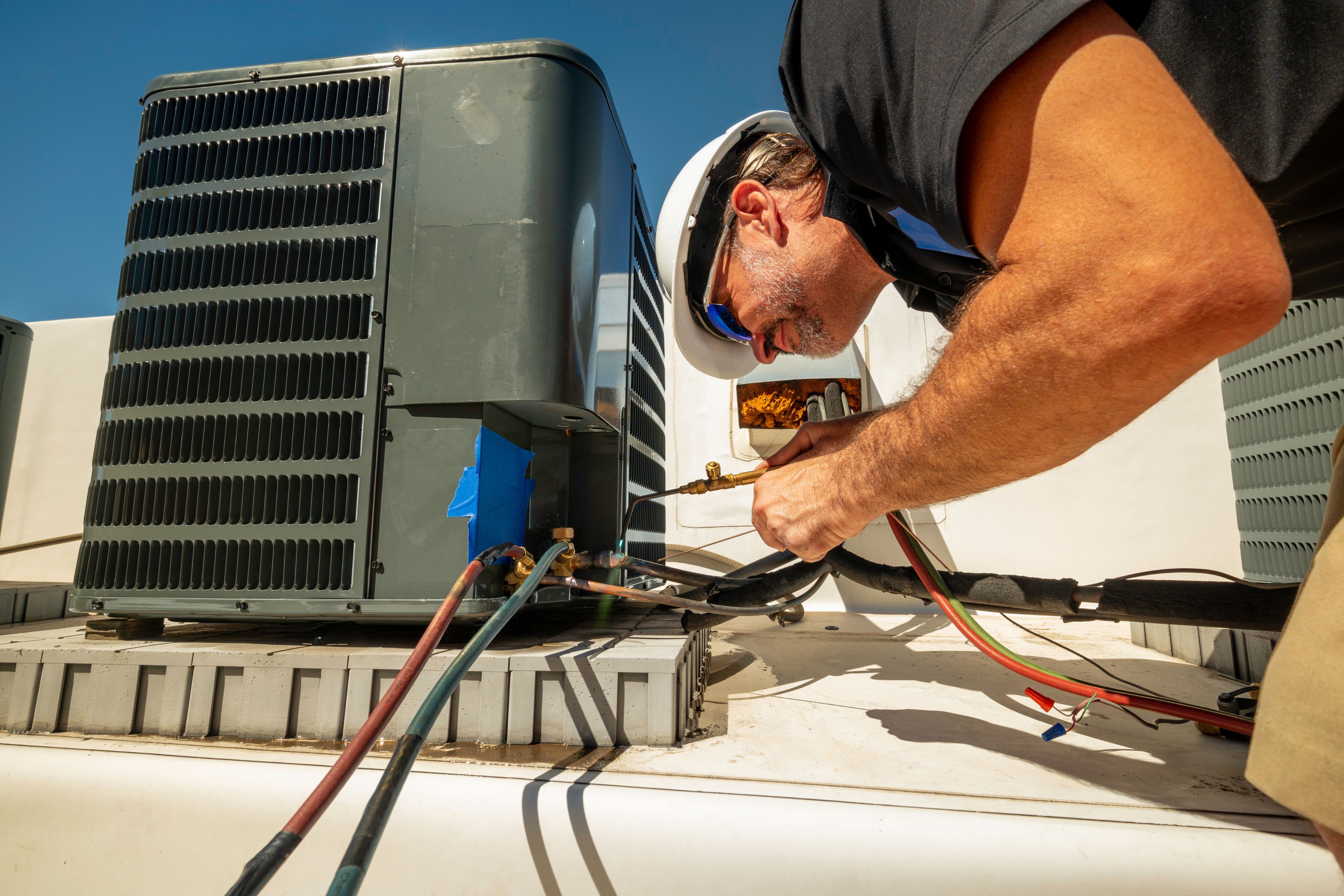 ProTech heating and air service vehicle on residential job