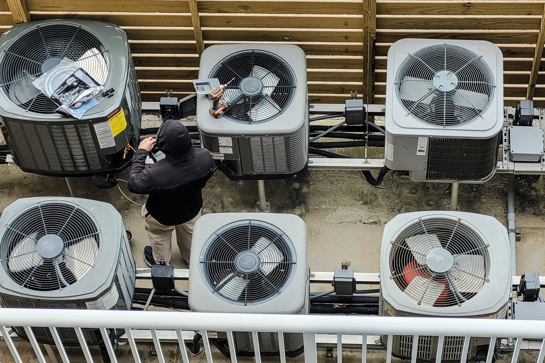 HVAC technician inspecting furnace and heating equipment