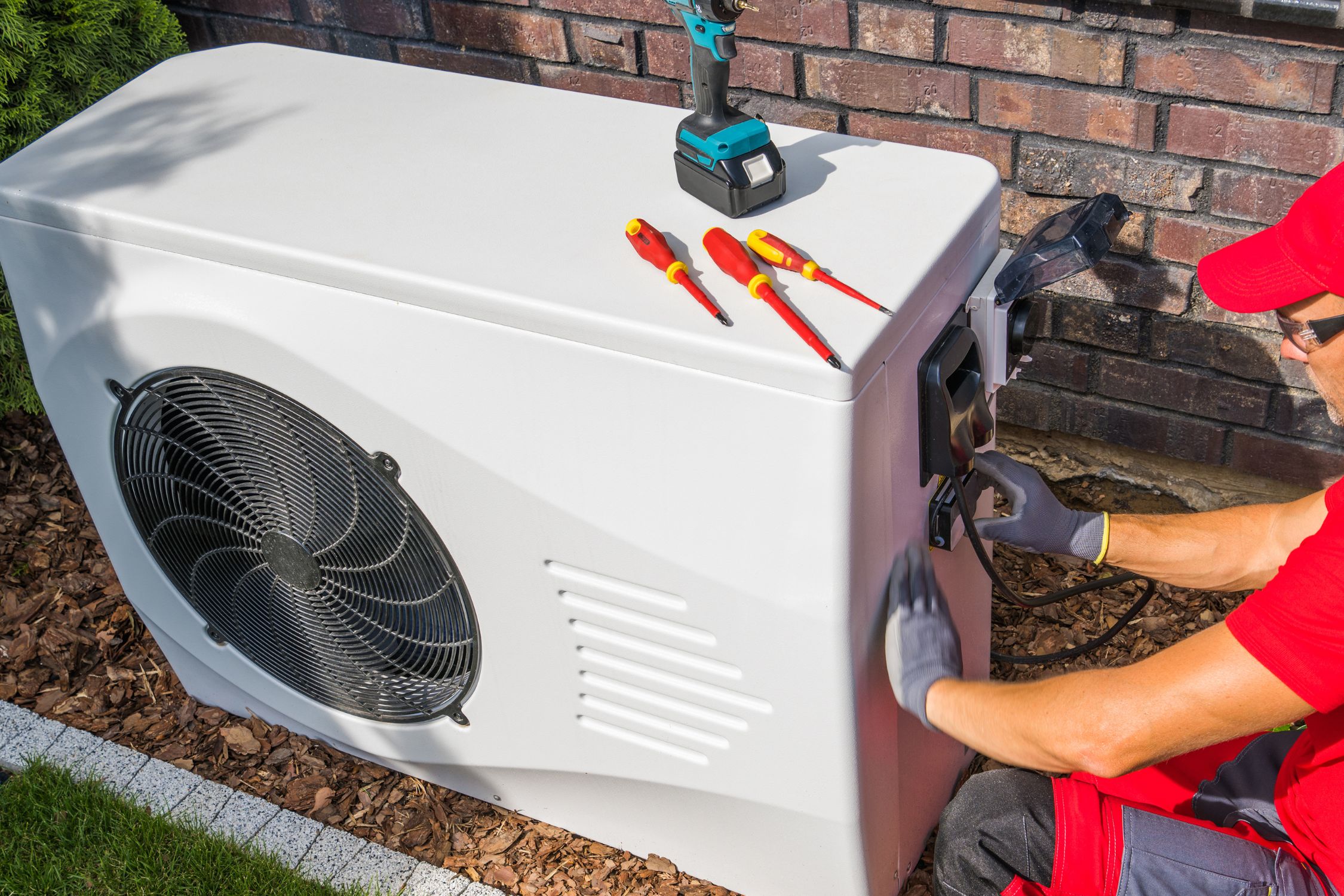 Local Athens, GA heating and air technician completing HVAC repair job