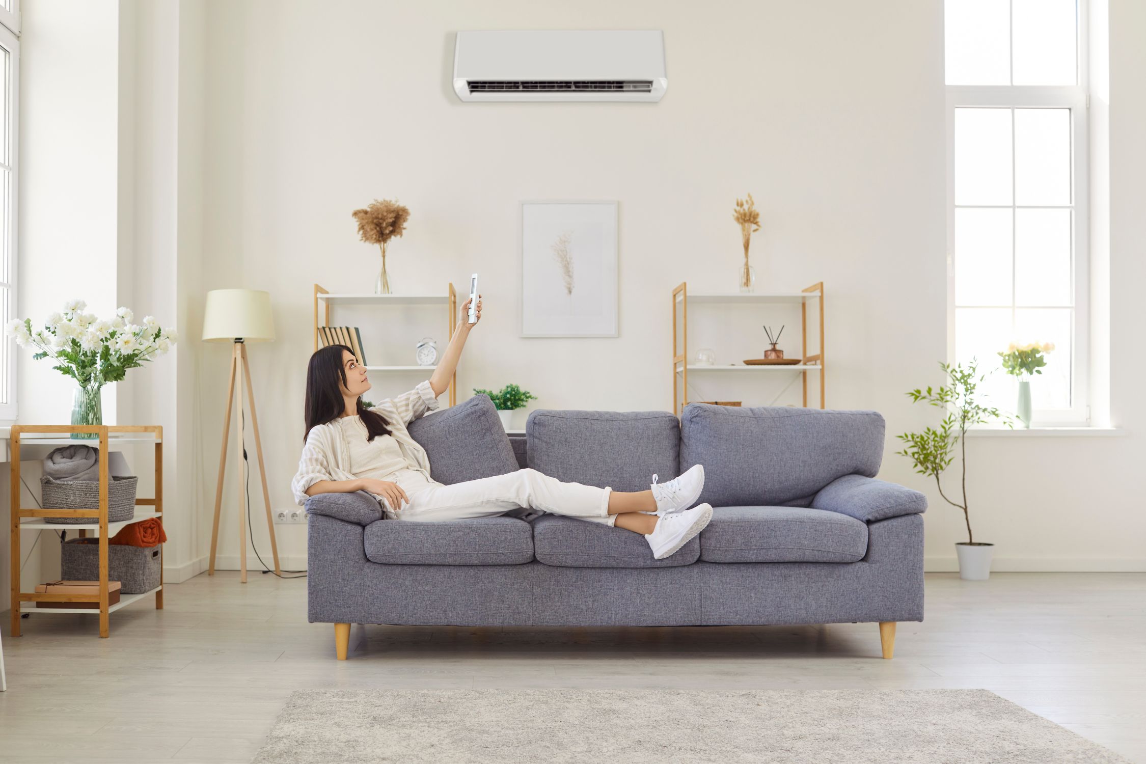 person comfortable in home with new hvac unit in summer