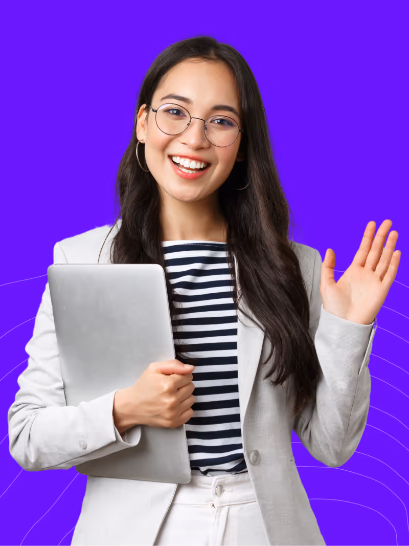 another happy team member wearing glassed and holding a laptop