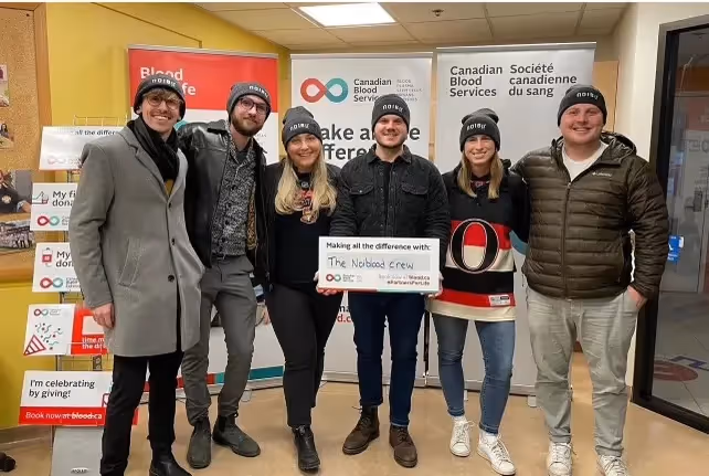 Noibu team donating blood