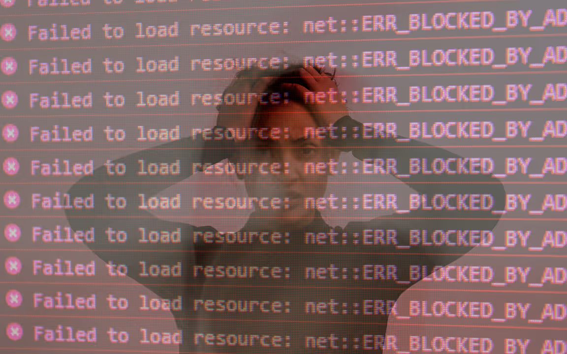 "Failed to load resource: net::ERR_BLOCKED_BY_" error code superimposed on a frustrated woman in a black shirt