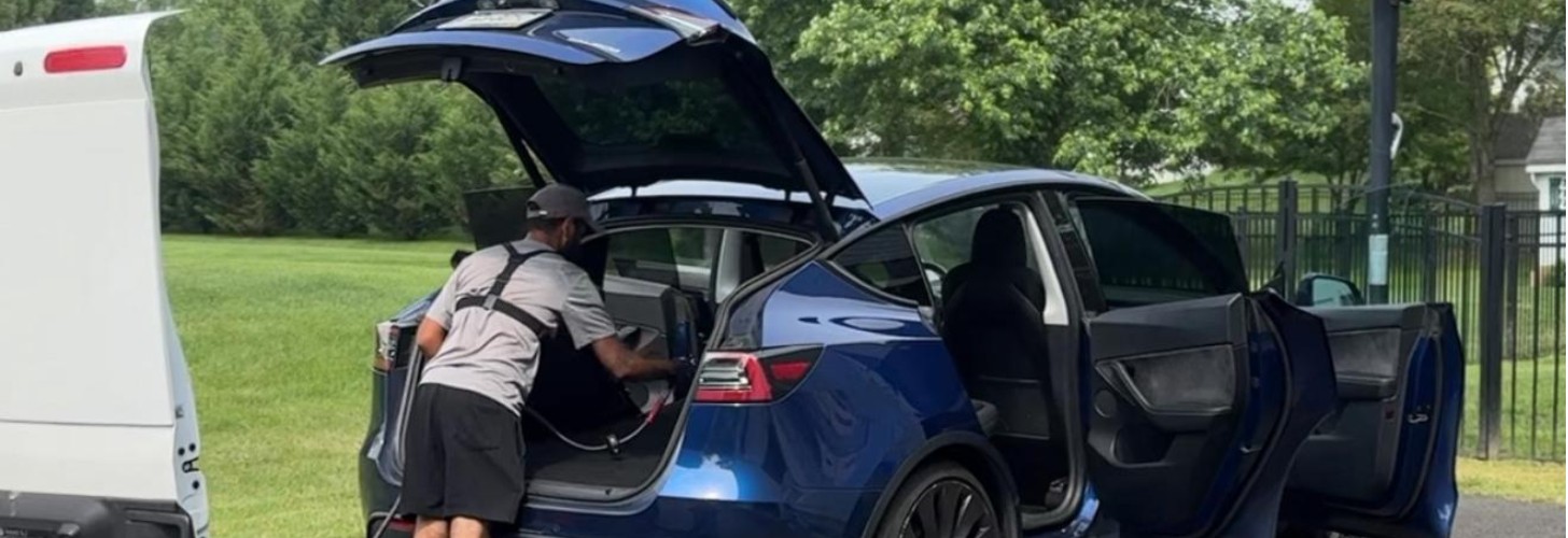 Car Being Detailed In Driveway