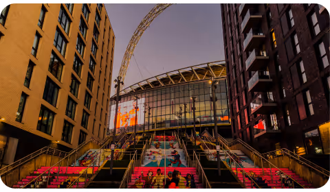 Wembley Stadium inbetween two modern buildings