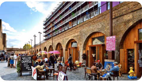 Locals enjoying coffee at a terrace in Deptford High Street