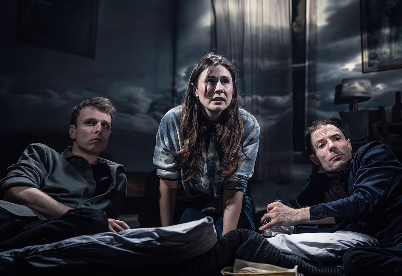 A group of people in a dark room