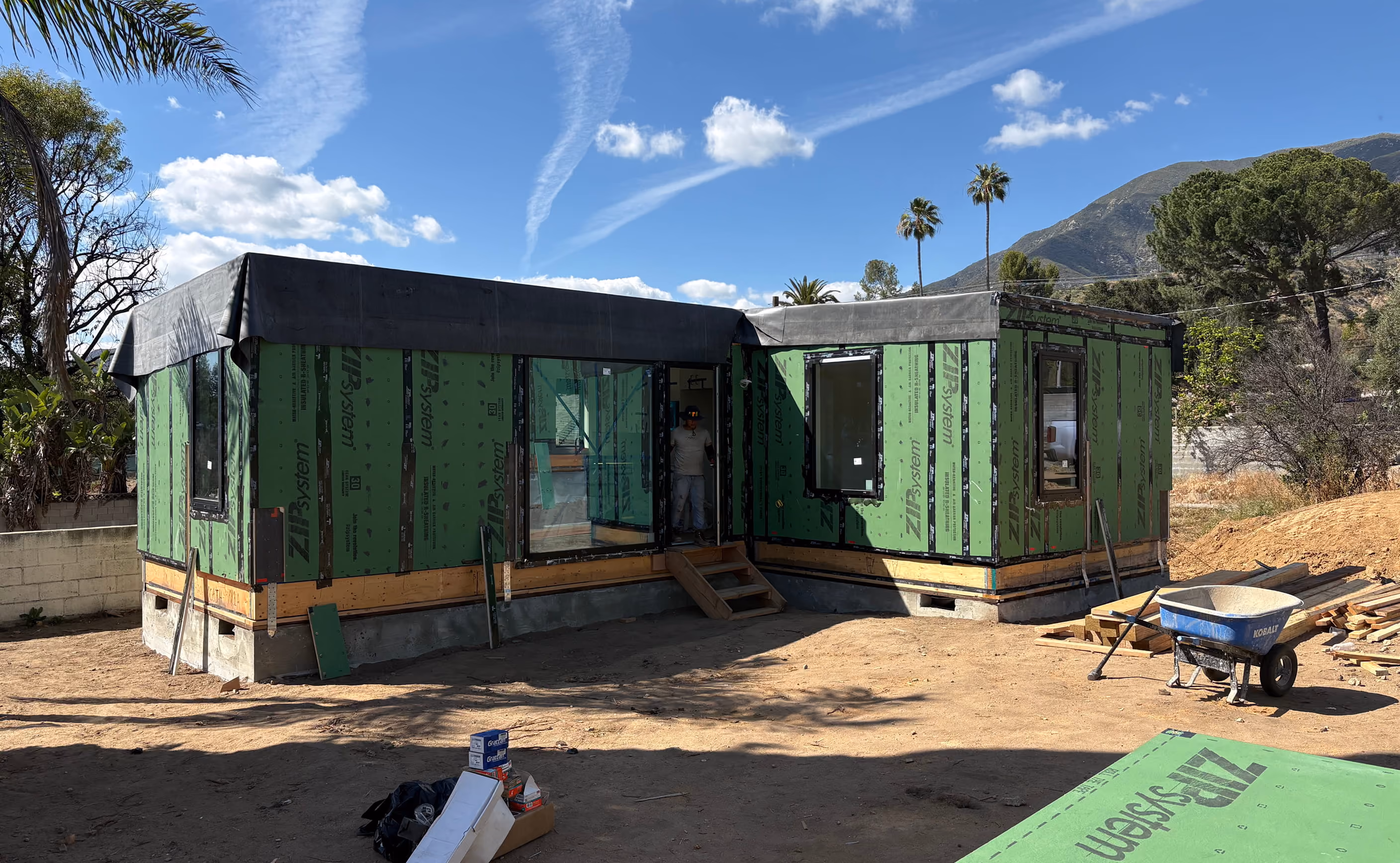 Factory-built modular home sections staged on the Glenrose construction site
