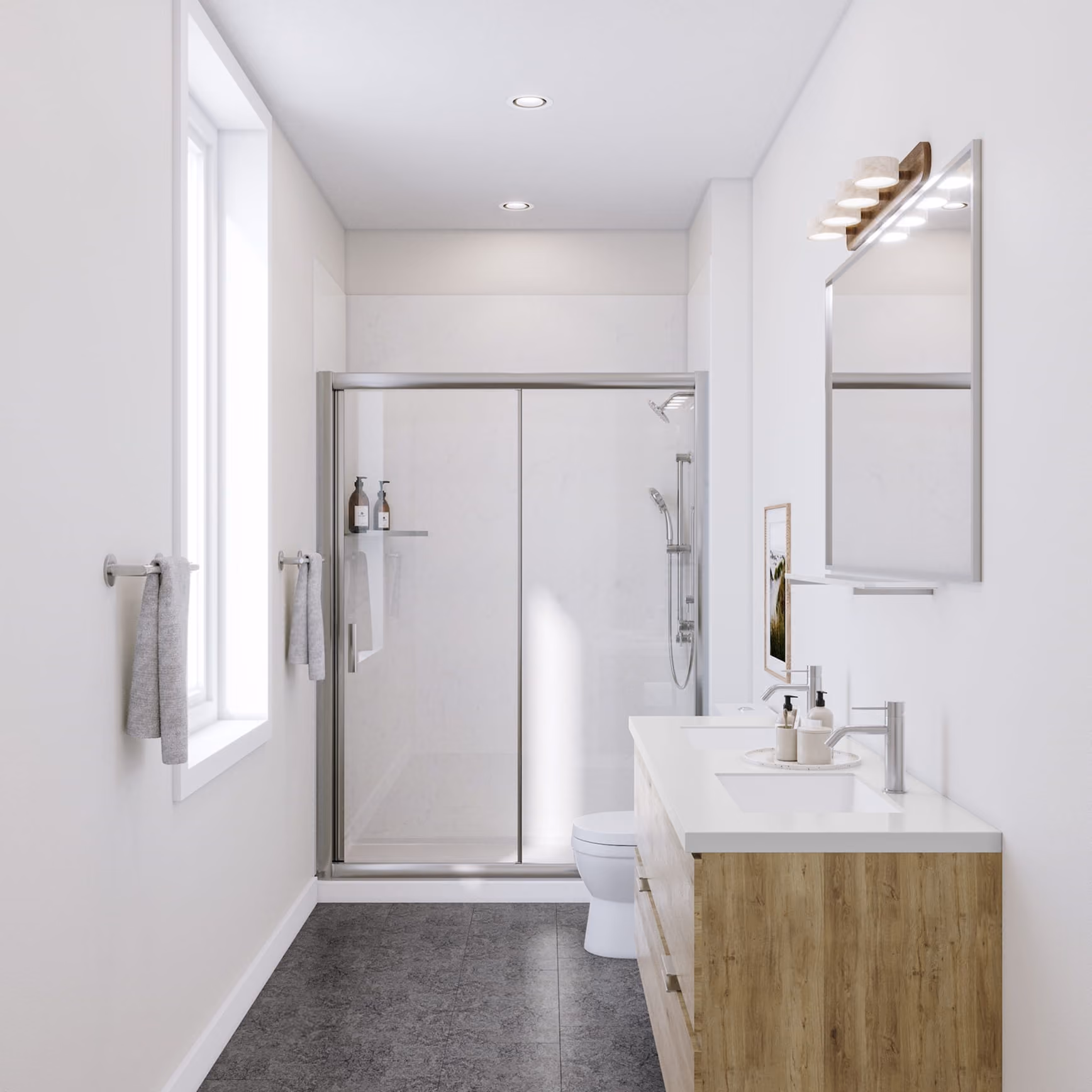 Narrow modern bathroom with a wood vanity, wall mirror, and glass-enclosed shower.