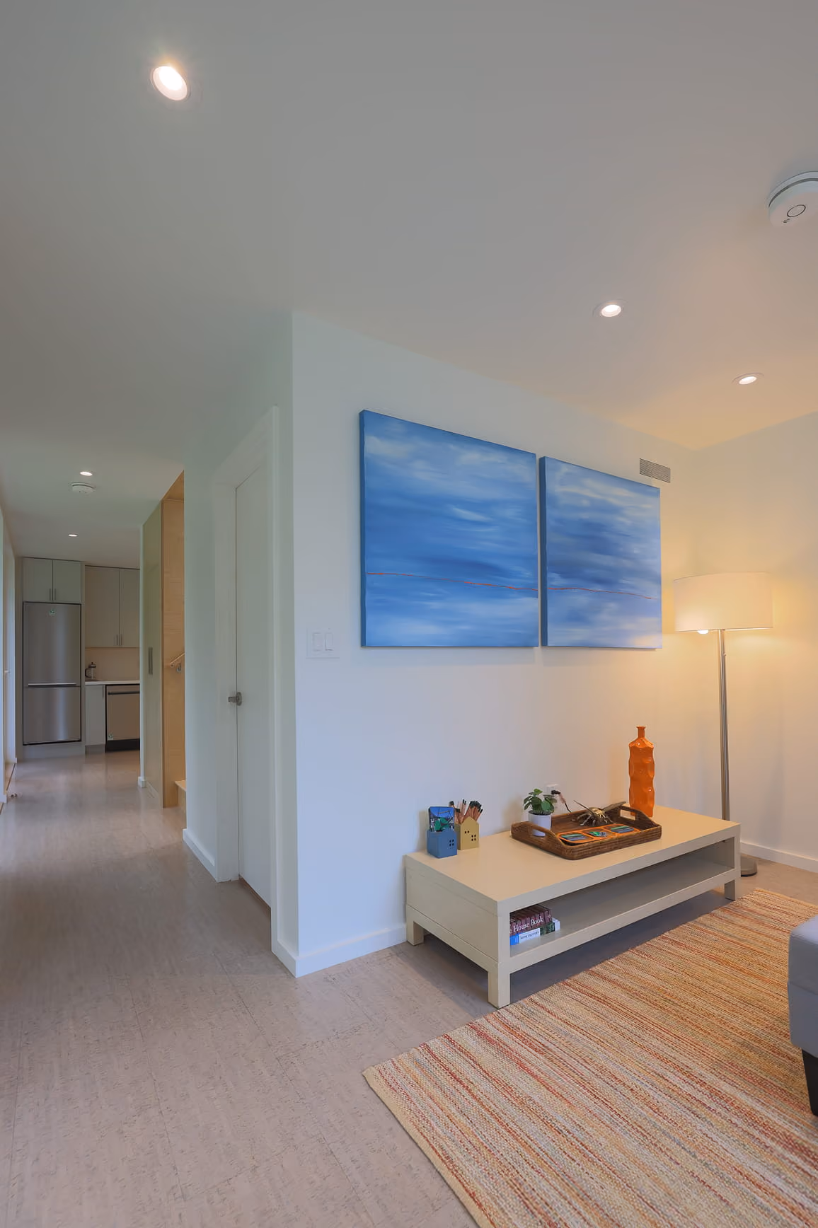 Living room inside the Dorothy ADU featuring natural light and minimalist finishes