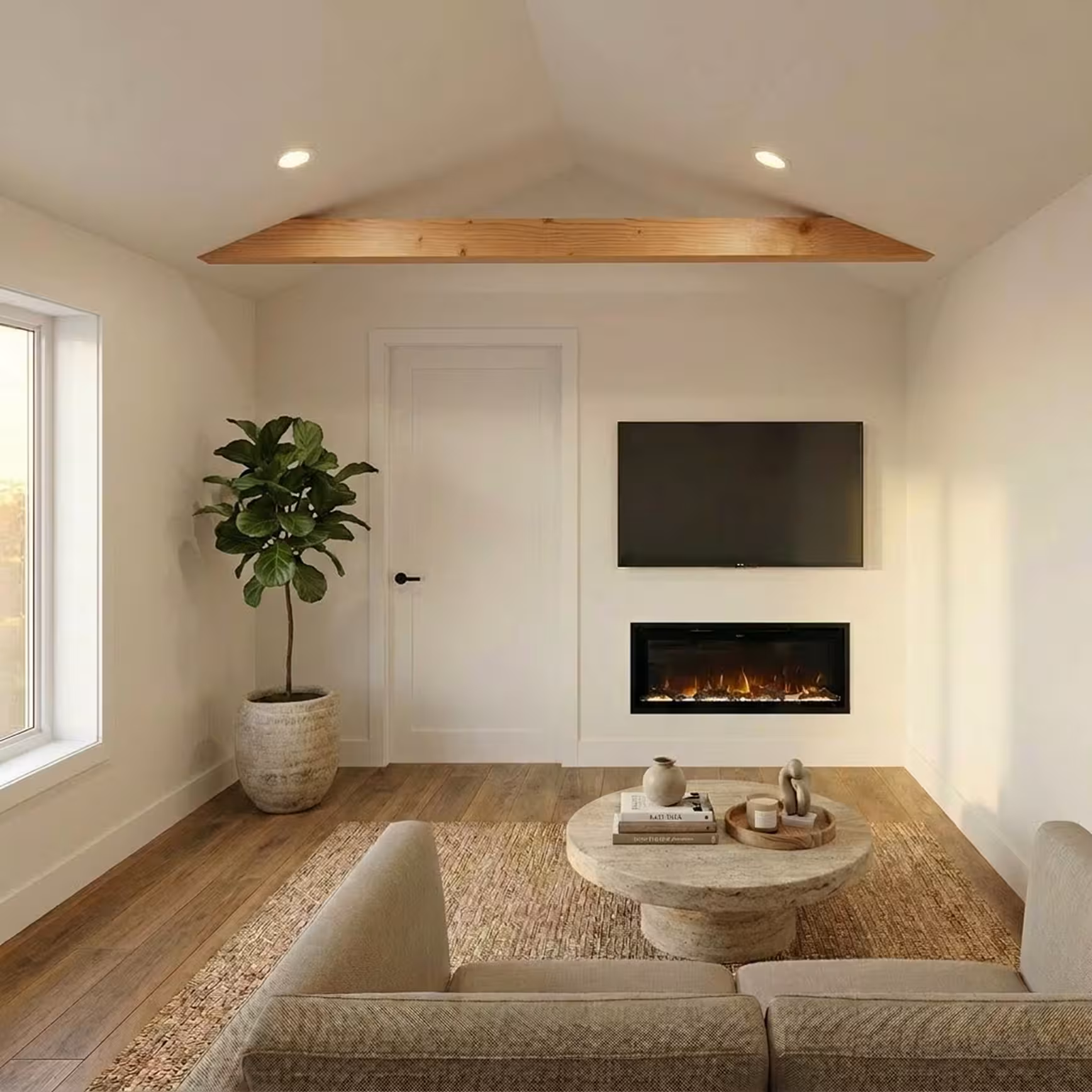 Minimalist living room with wood floors, a vaulted ceiling beam, wall-mounted TV, fireplace, sofa, coffee table, and potted plant.