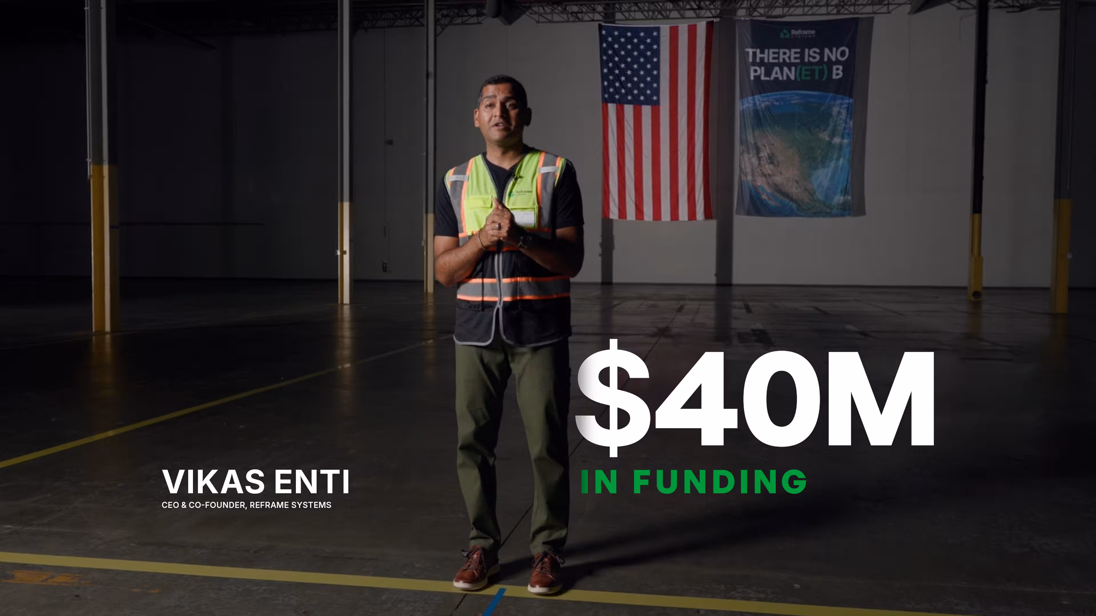 Vikas Enti, CEO and Co-Founder of Reframe Systems, standing in an empty microfactory warehouse next to a graphic reading "$40M in funding."