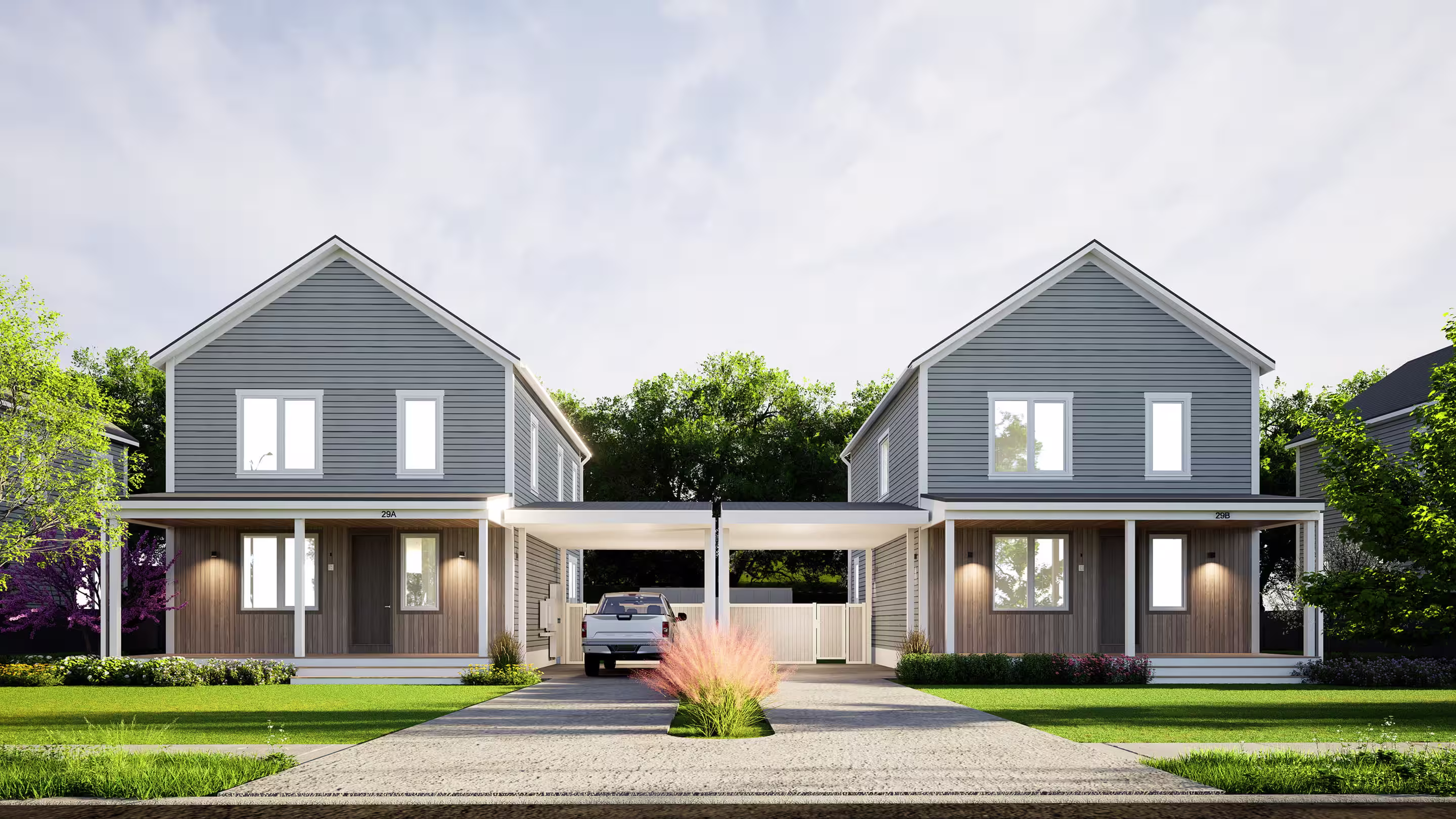 Two modern modular homes with landscaped front yards