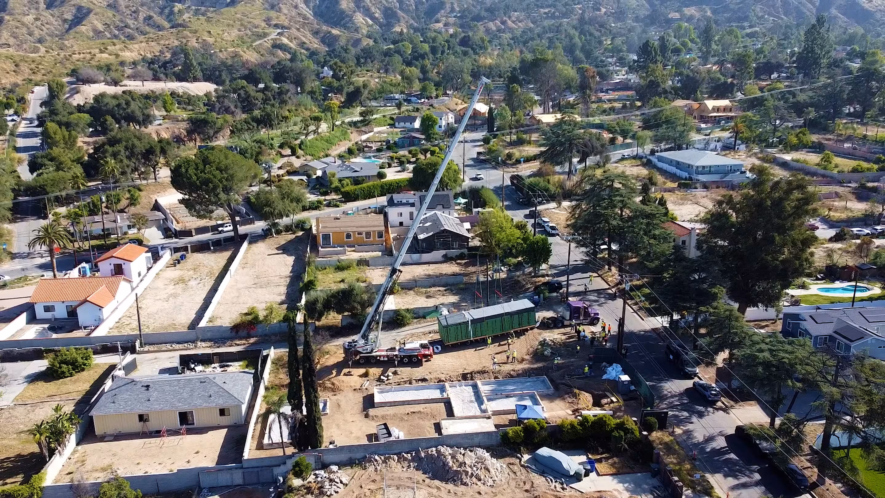Aerial view of residential neighborhood and construction development