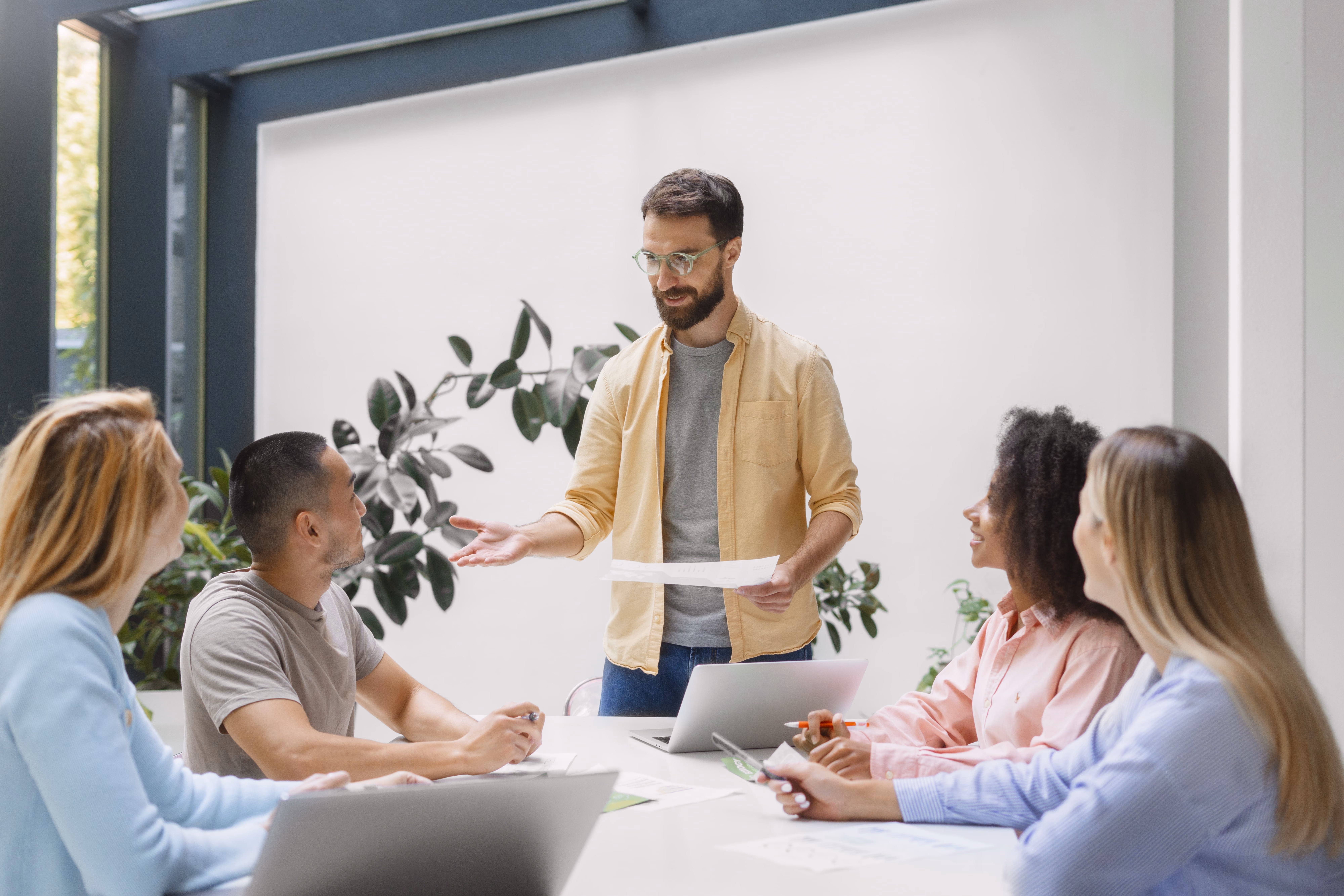 people-working-tech-brand-together
