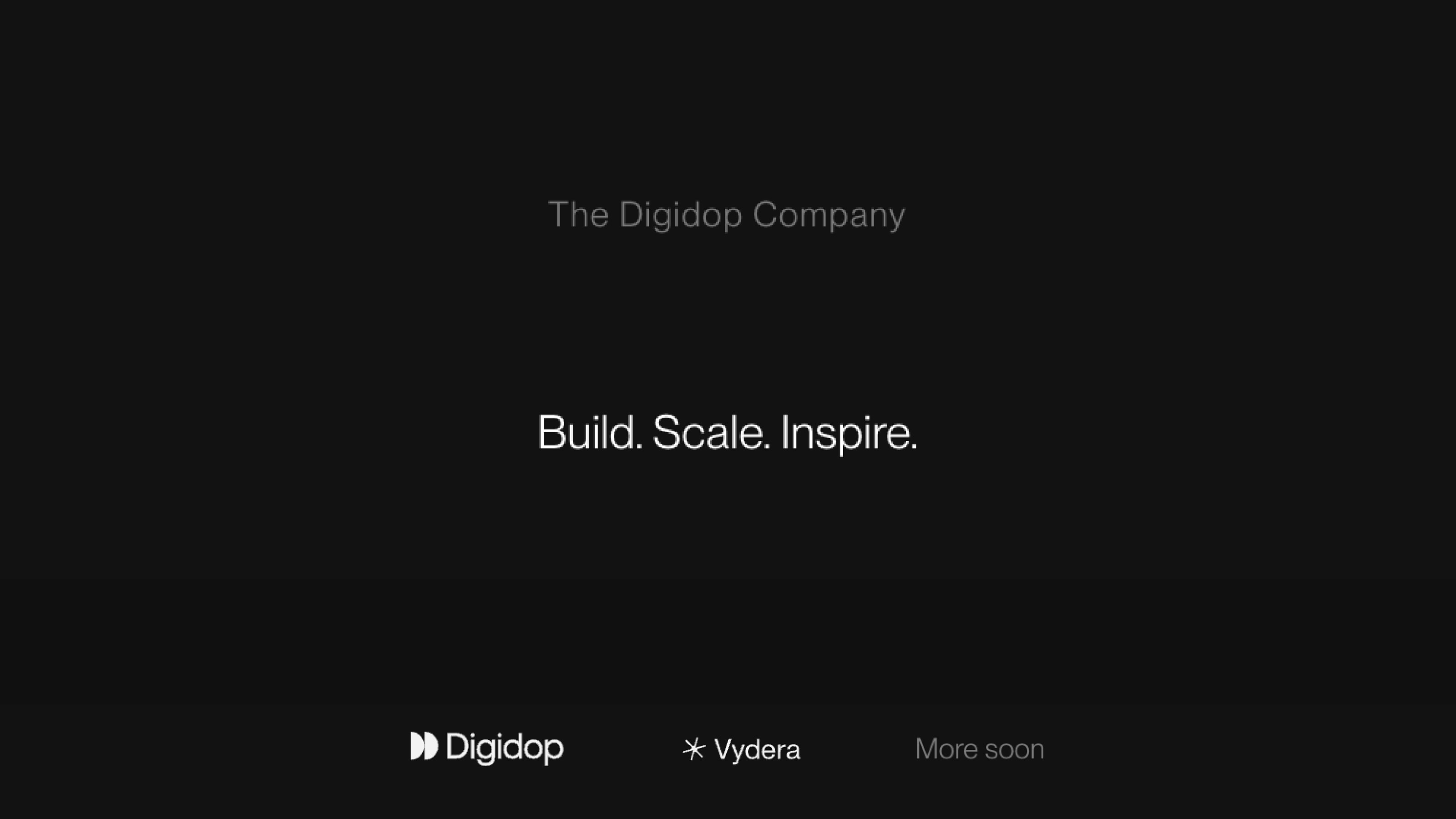 Minimal dark landing page displaying “The Digidop Company” with the tagline “Build. Scale. Inspire.” and the Digidop and Vydera logos at the bottom.