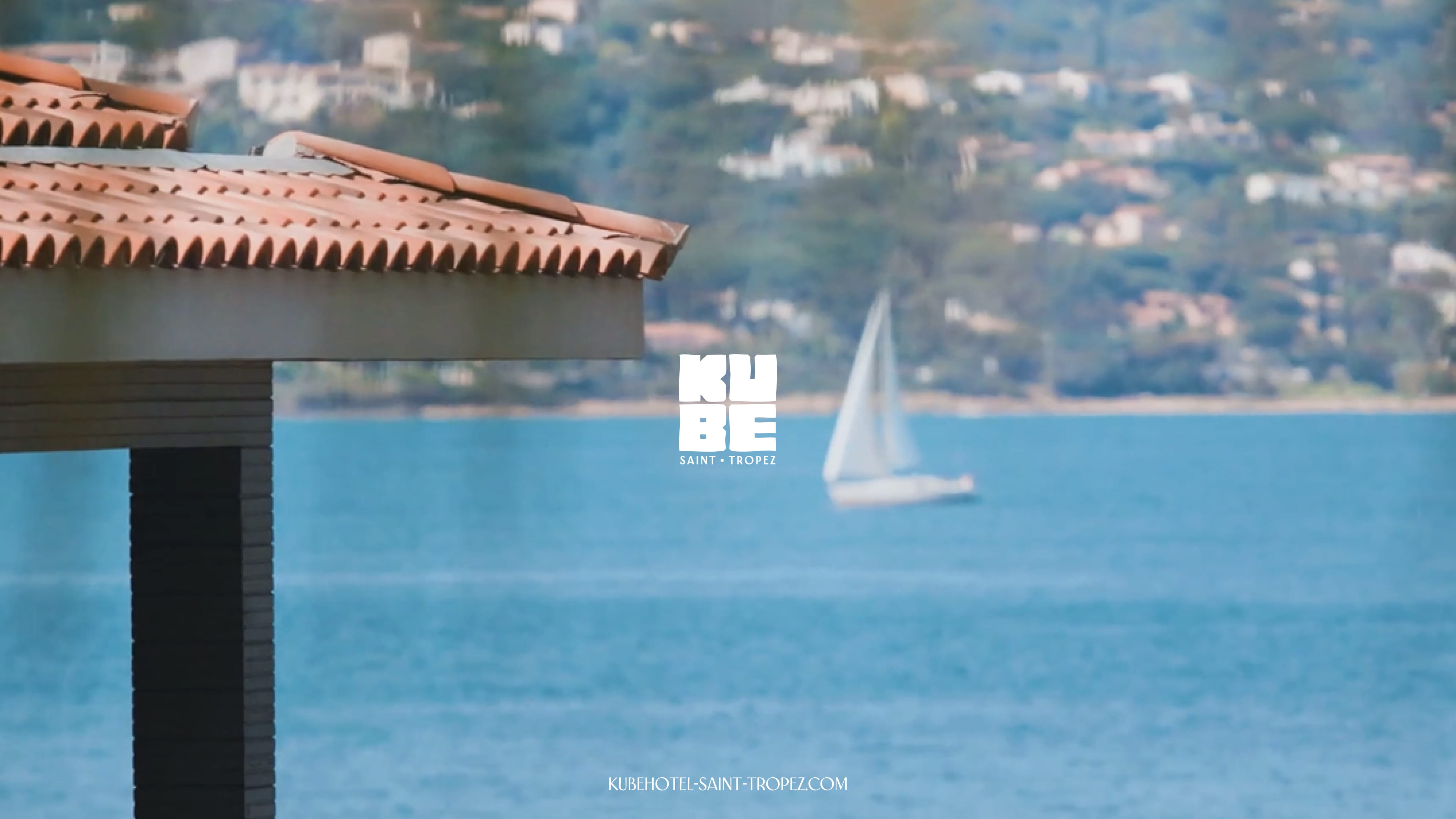 Saint-Tropez sea view with Kube Hotel branding, premium universe and strong visual identity