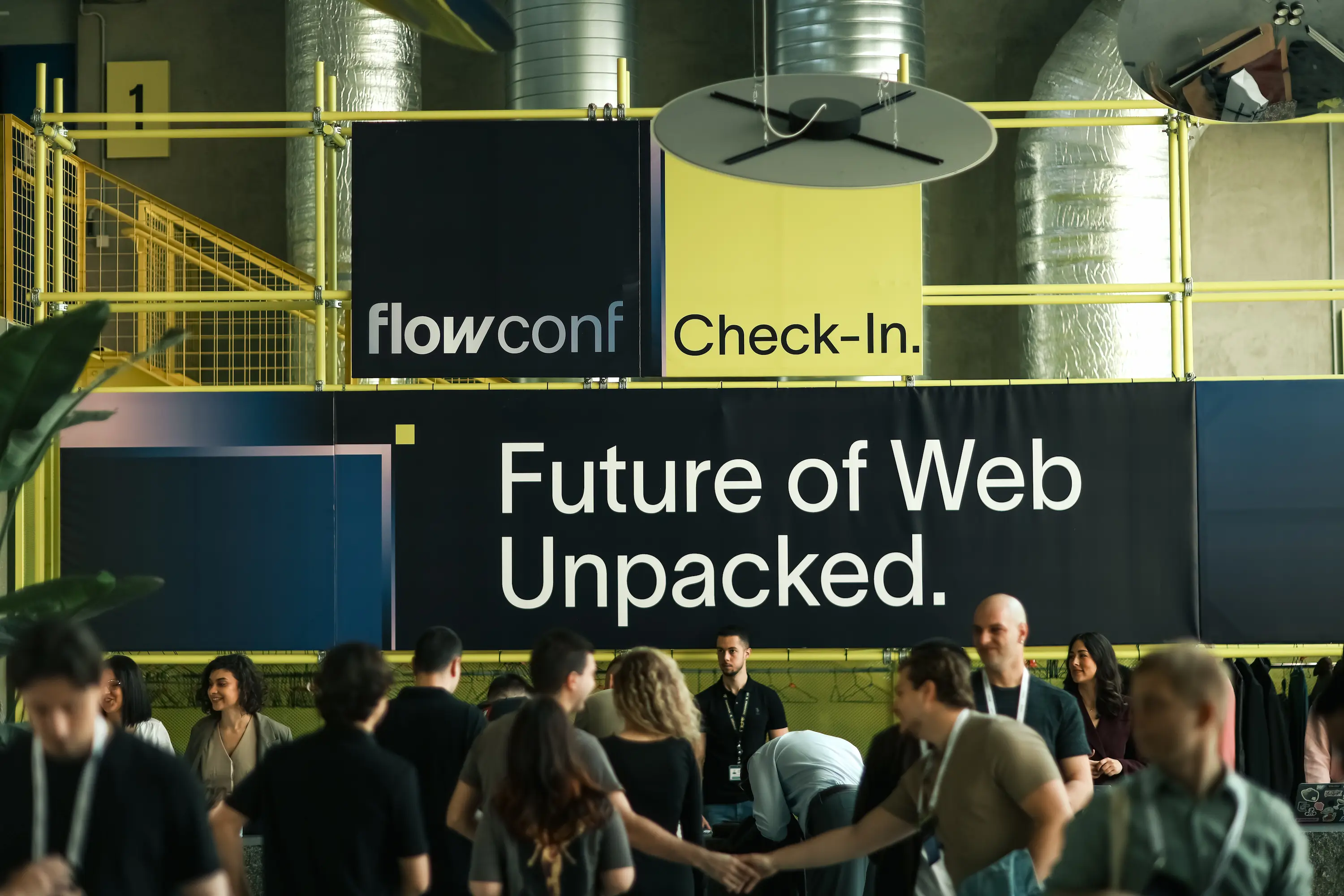 Attendees networking during flowConf, an international event focused on the future of web, design, and no-code technologies.