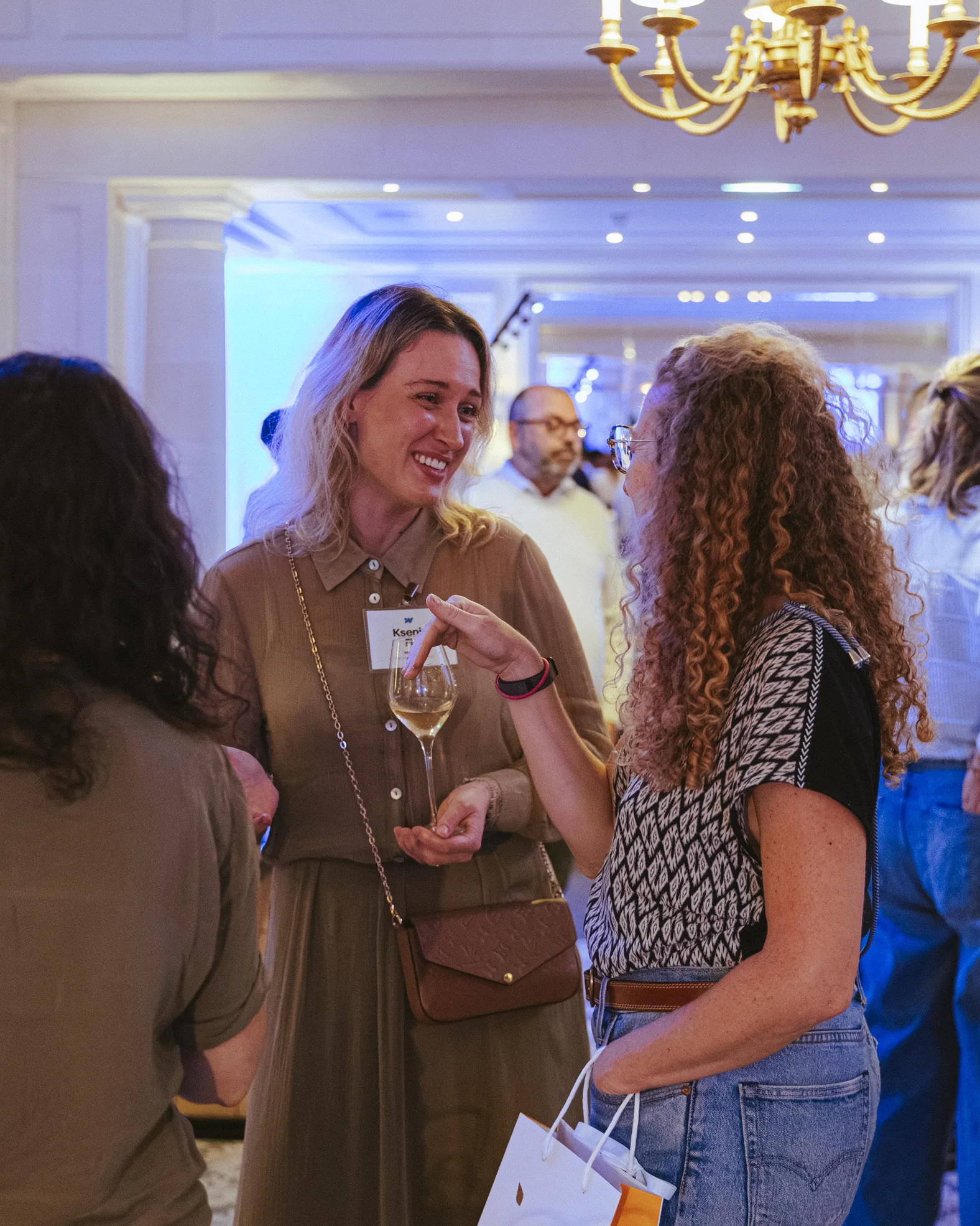 Attendees networking during the World Wide Webflow Tour in Paris.