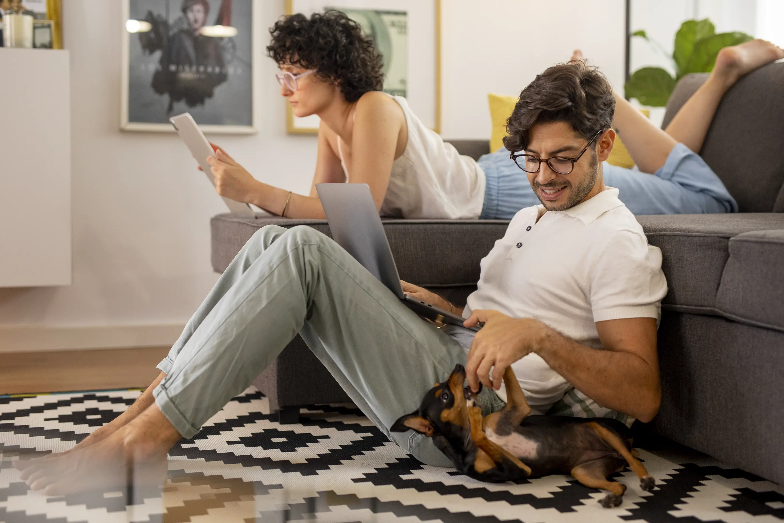 person-working-from-home-with-pet-dog