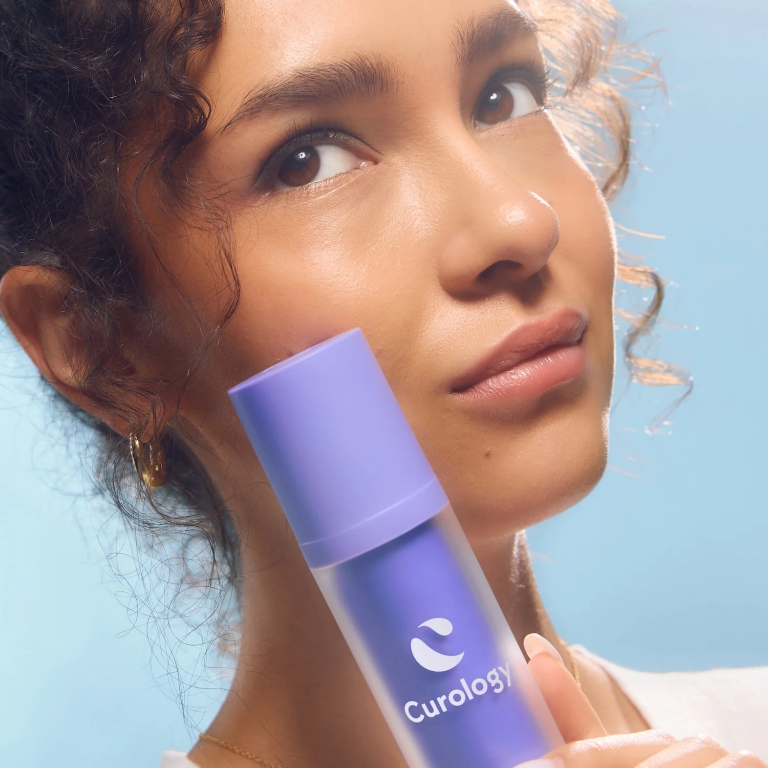 Image of woman with Curology product